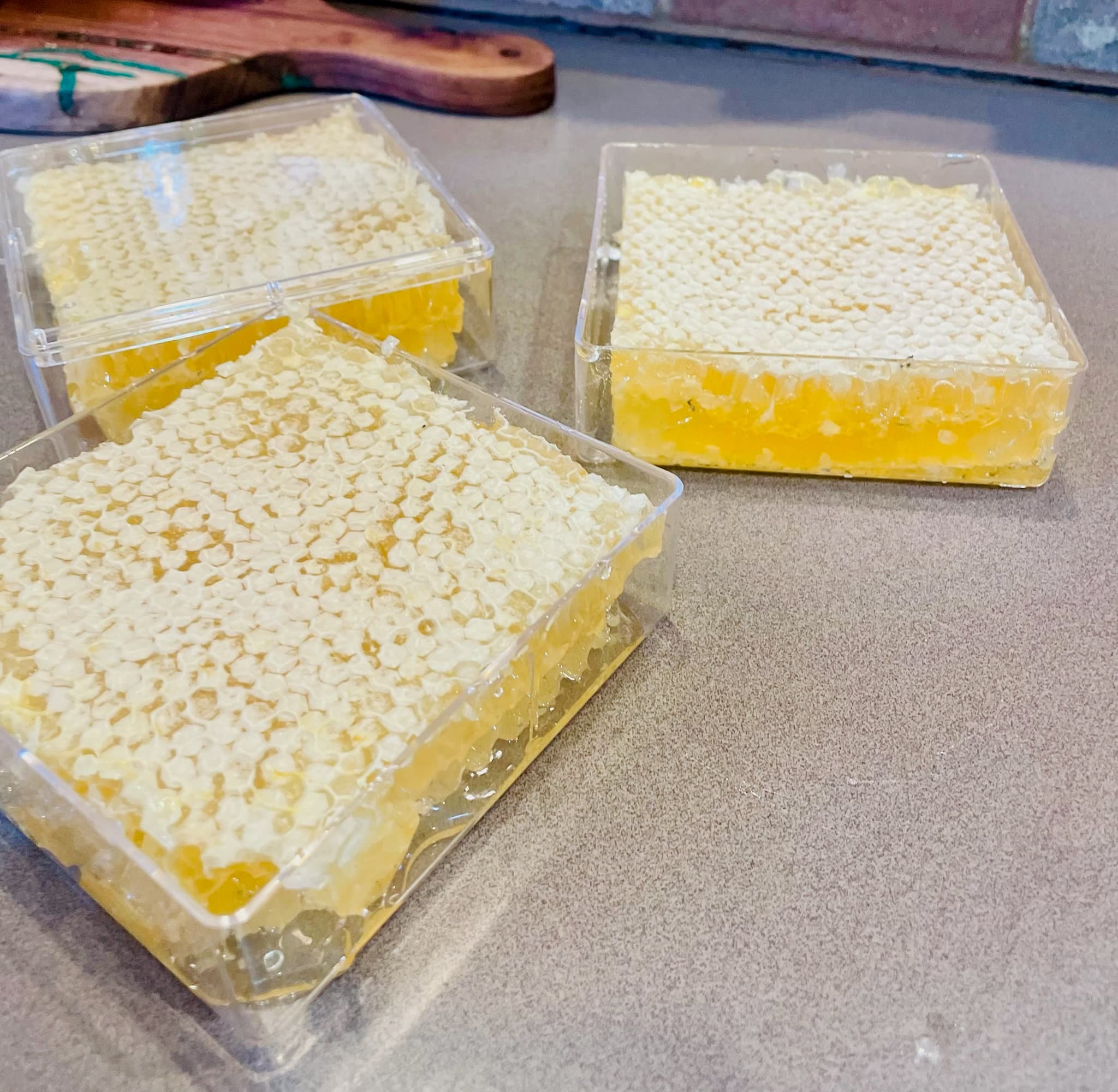 Packaged squares of raw honeycomb ready for sale